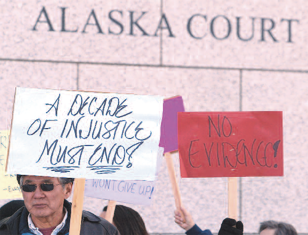 Above, supporters of the four convicted men rally Oct. 12, 2007, in front of the Rabinowitz Courthouse to bring continued atten-tion to the 10-year-old case of four young men found guilty of beating 15-year-old John Hartman to death. Many people continue to voice the innocence of the four men.