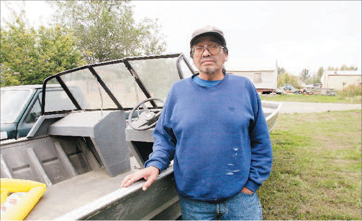 In fall 1997, Gerry Roberts took this riverboat, shown outside his home in Tanana in 2004, down the Yukon River on an extended moose hunting trip with his 19-year-old son, Marvin. Within days of that trip, Marvin Roberts faced murder charges in Fairbanks.