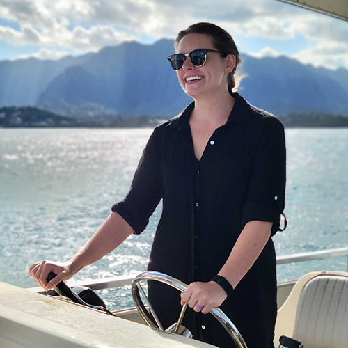 Courtney Clough in a boat. Photo courtesy of Clough