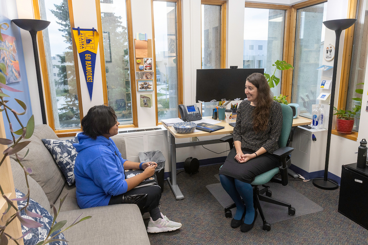 UAF student Dulce Villasenor, left, with advisor Vicky Avery, right, at Student Support Services for College Tour shoot Thursday, September 8, 2022. UAF Photo by Eric Engman