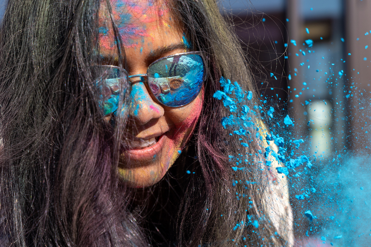 Members of the UAF community gather to celebrate Holi, the exuberant festival of colors that marks the beginning of spring in India, Saturday, April 12, 2025 in front of the Wood Center. UAF Photo by Eric Engman