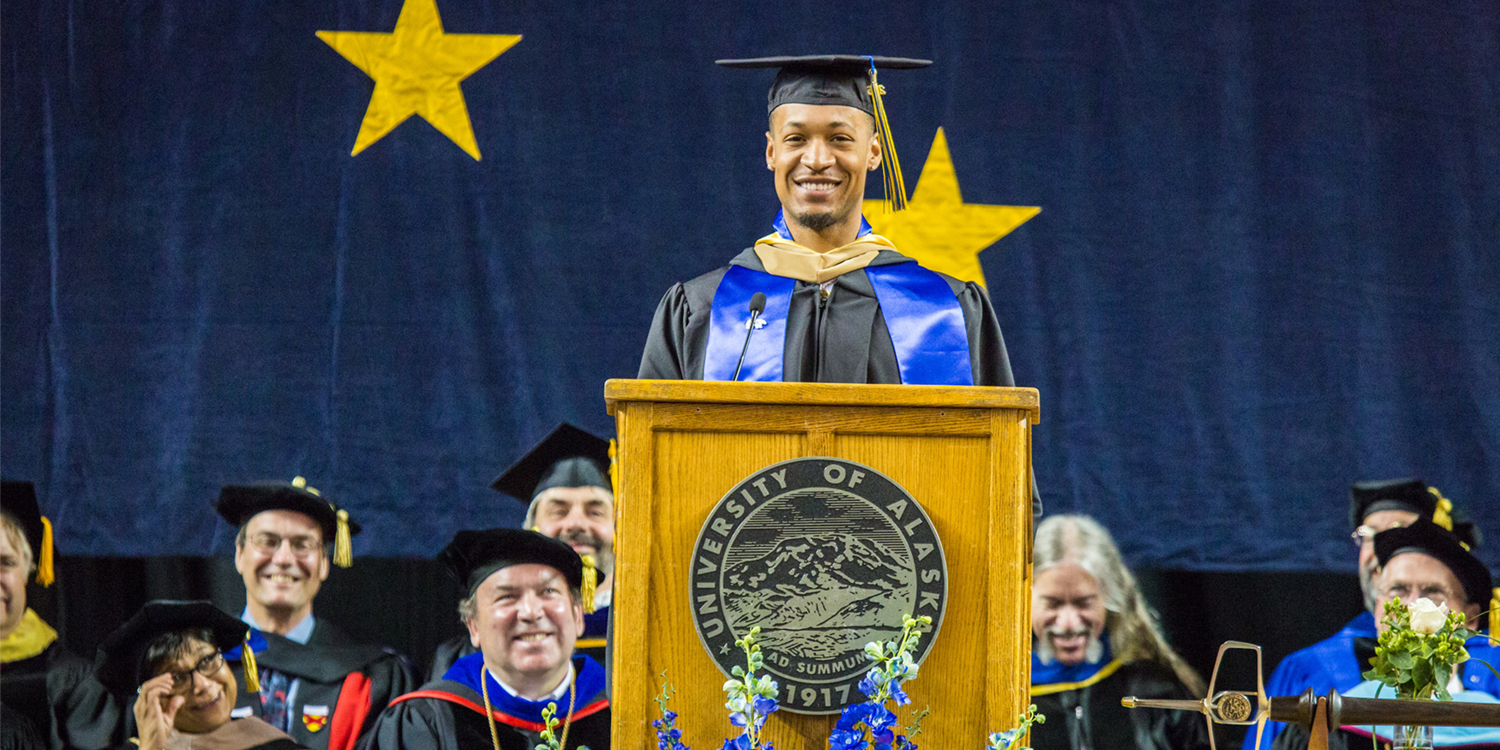 Class speaker Joseph Slocum speaks of his time at UAF during the commencement ceremony May 8, 2016, at the Carlson Center. Slocum received an undergraduate degree in communication in 2015 and a Master of Business Administration degree in 2016. UAF Photo by JR Ancheta