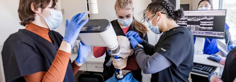 Students practicing being dental assistants