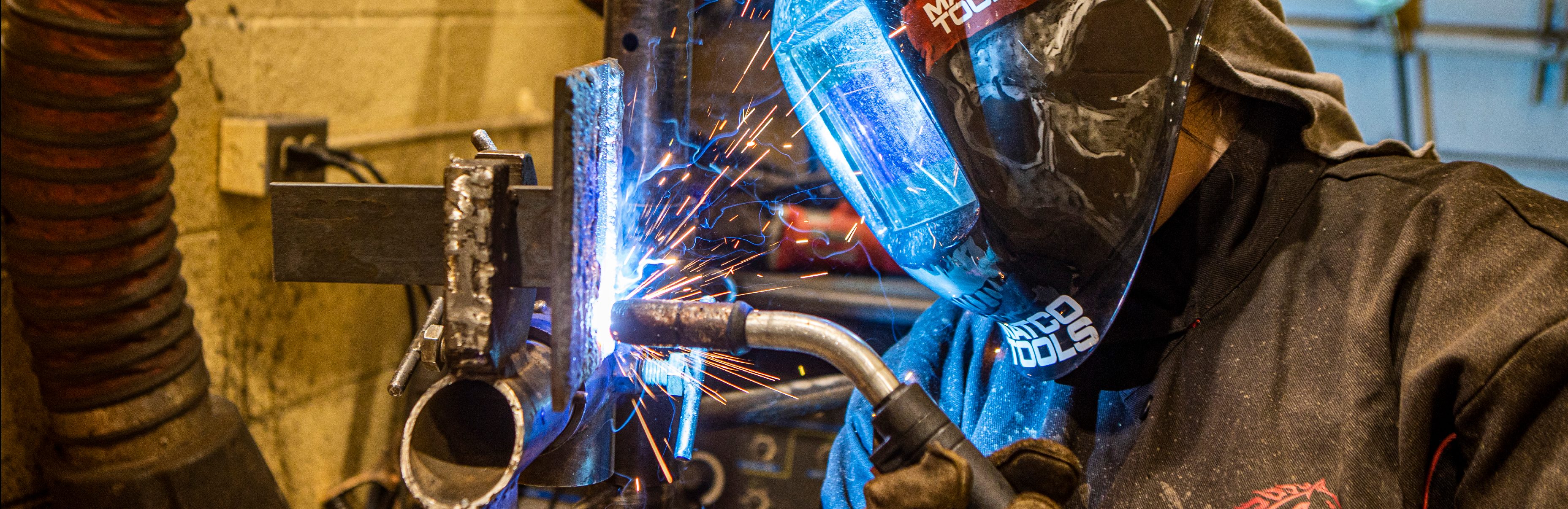 Welder practicing welding skills