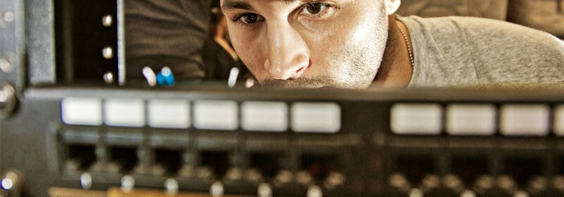 Student looking at a piece of technology