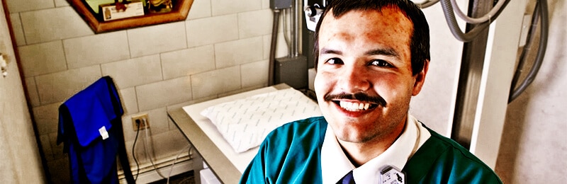 man smiling at a camera