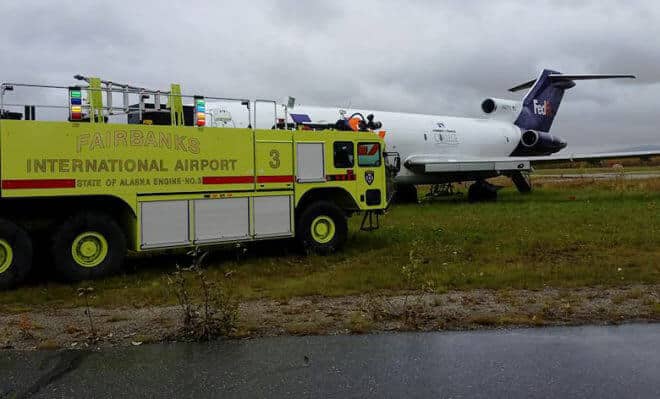 A Fairbanks International Airport fire truck parks near the UAF Community and Technical College 727 aircraft during the state certification test of airport fire rescue personnel on Sept. 19. UAF photo by Kevin Alexander.