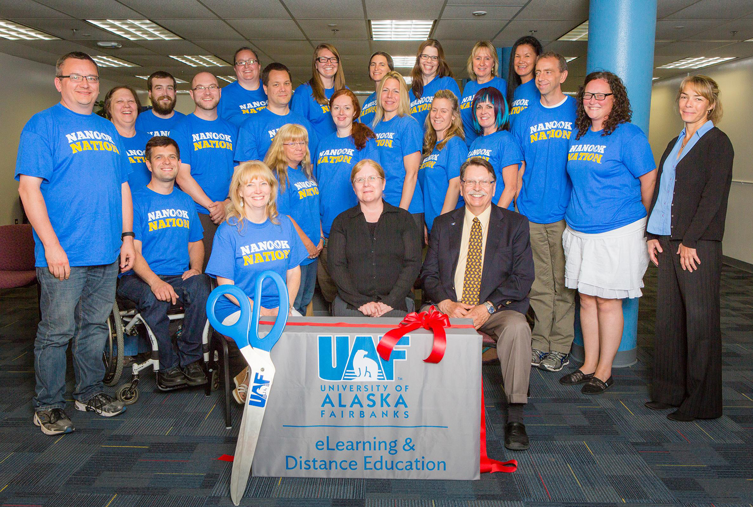 Staff photo during the ribbon cutting.