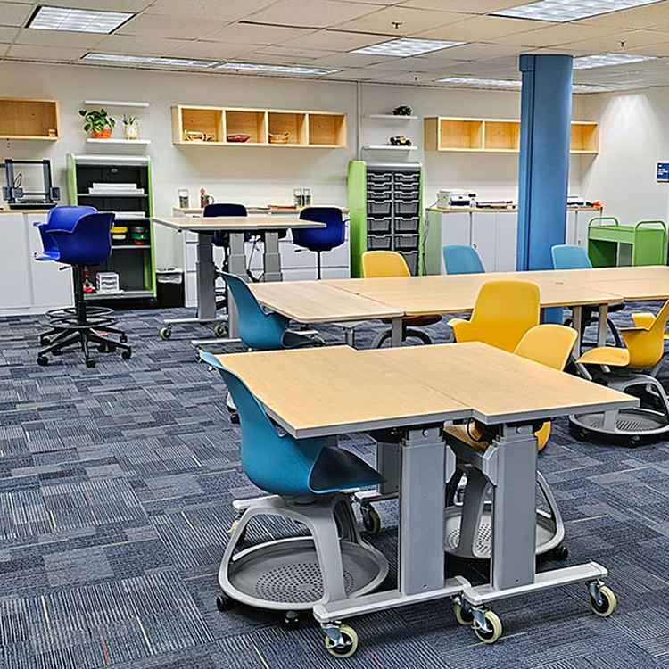 Makerspace interior showing desks and equipment