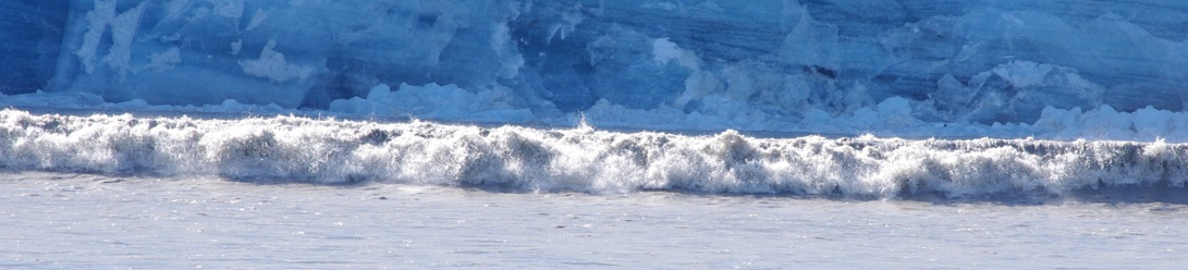 Glacier falling into the ocean