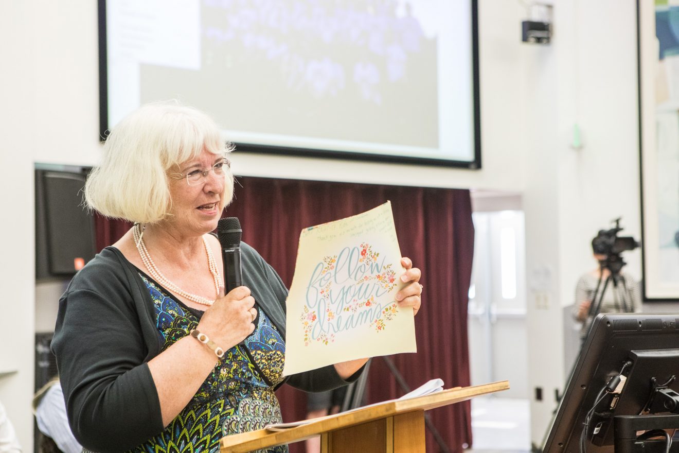 UAF photo by JR AnchetaDenise Wartes welcomes students at their parents to the 2017 Rural Alaska Honors Institute graduation.