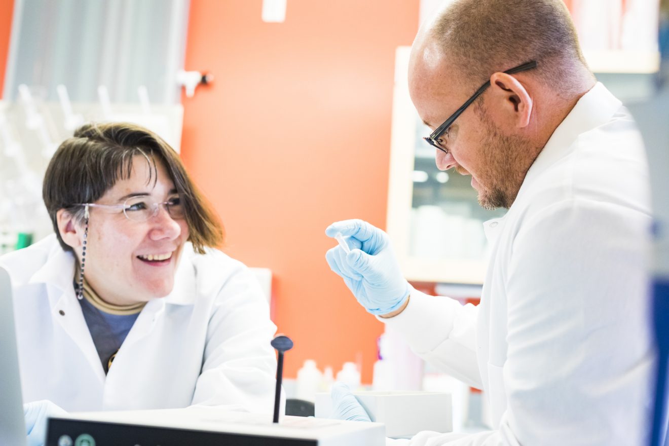 Tynan Becker (left) and JD Harwell explore how the immune system launches an effective response to influenza using the same enzymes as the immune cells Sunday, Jan. 21, 2018, in the Murie Building's immunology lab. Becker, a Ph.D. candidate, is a research mentor to Harwell, who is majoring in biological sciences, chemistry and computer engineering. Their work is supported by the NSF-funded Biomedical Learning and Student Training program.