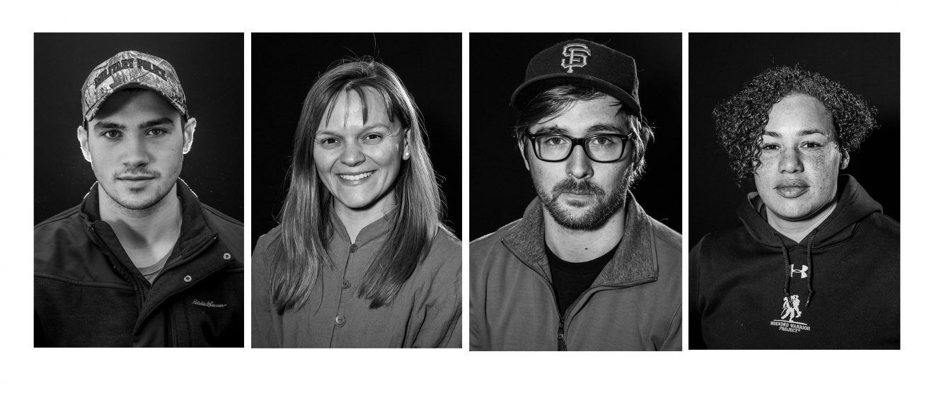 Four head shots side by side. Photos are black and white.