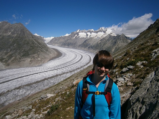 Heather Aruffo standing with a glacier in the background.