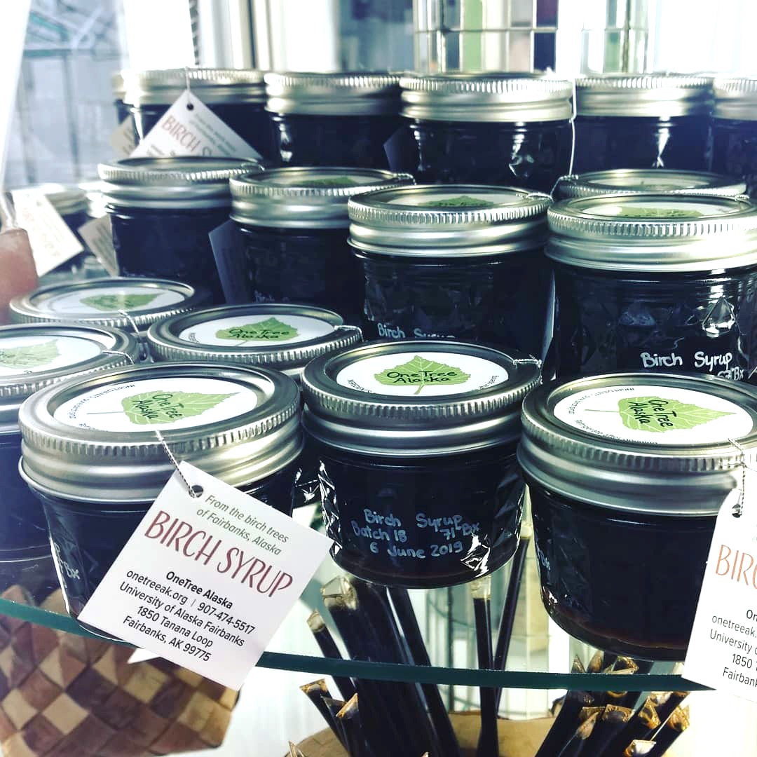 OneTree Alaska selling holiday birch treats and luminaria