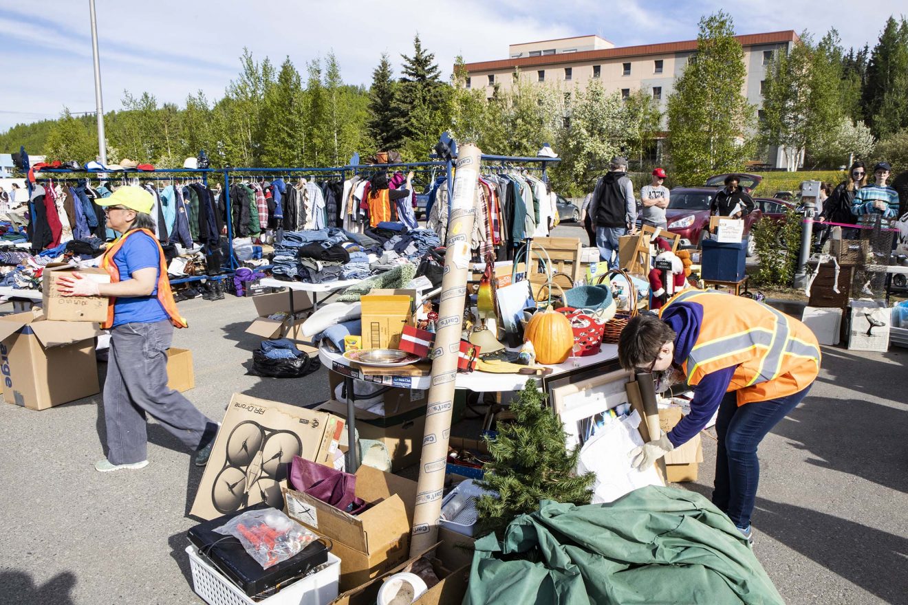 Volunteers sort through donations before the 2019 Really Free Market sponsored by UAF Summer Sessions Saturday, May 18, 2019.