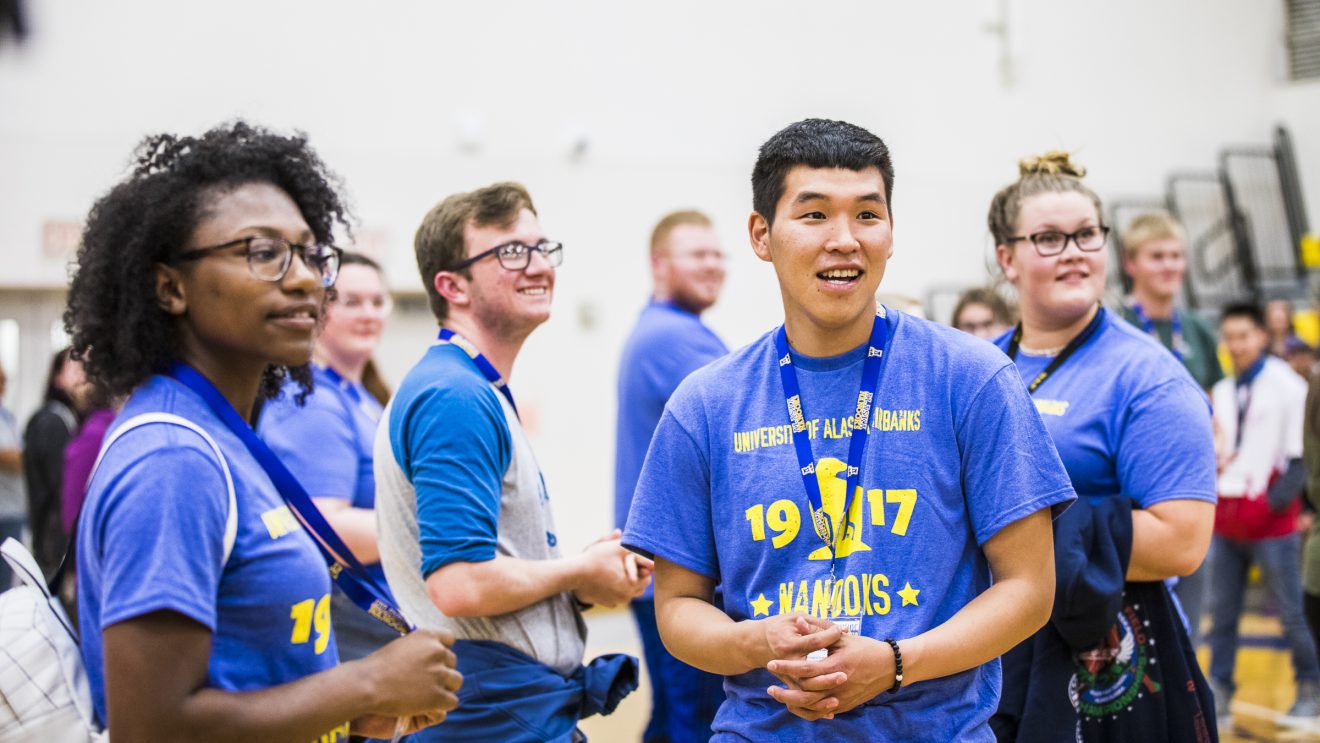 Students gather in the gym as part of orientation.