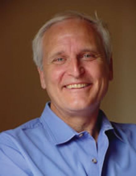 Head shot of Skip Walker. He is wearing a blue dress shirt.