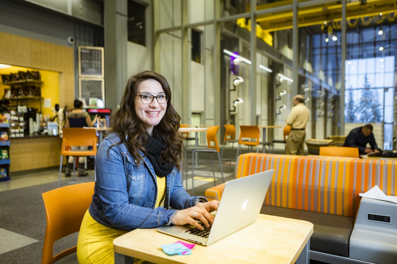 Faith Fleagle on a laptop