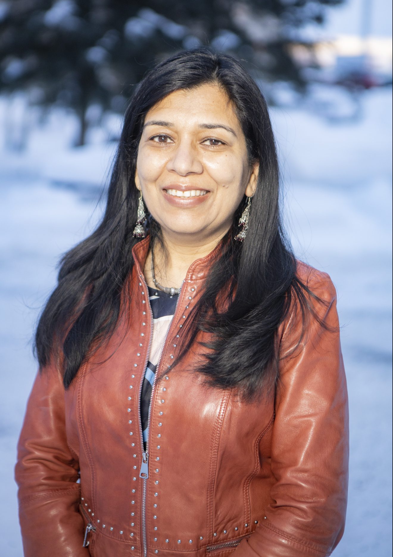 Head shot of a woman taken outside in winter.