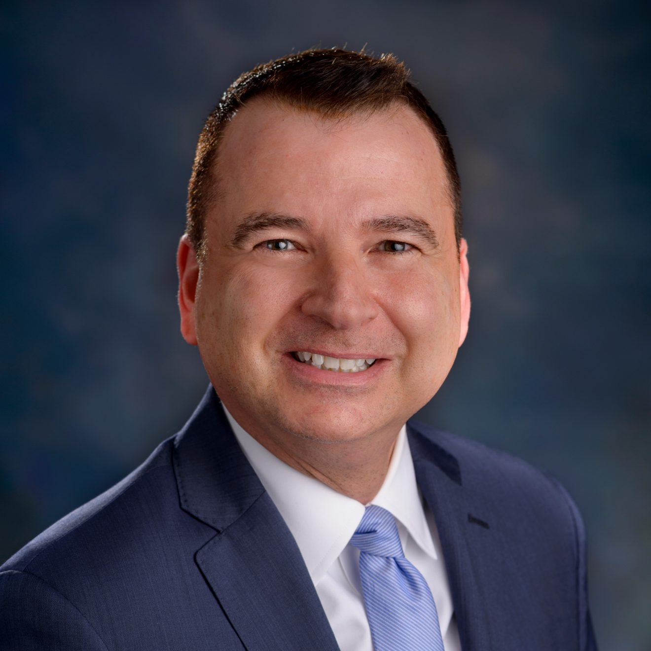 Head shot of Timothy Renick.