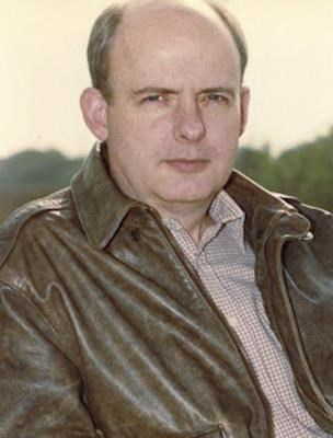 Head shot of a man outside