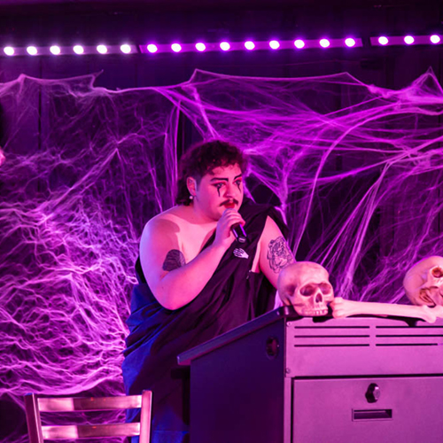 Zeke Shomler reads at the 2023 Dead Writers event. UAF Photo by Sarah Manriquez