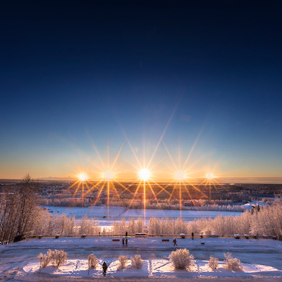 composite timelapse images of the winter solstice sun arc as seen from the Fairbanks campus