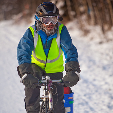 Person on a bike in the winter
