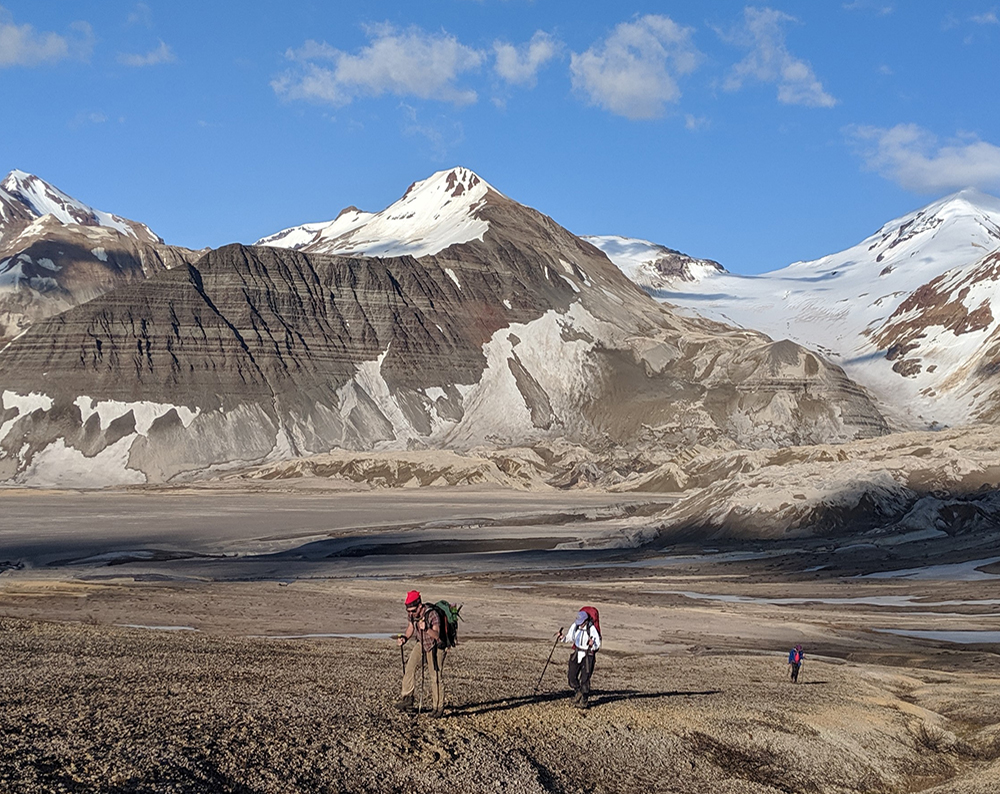 Return from the hike to the rim of Katmai Caldera with Whiskey Ridge at the background