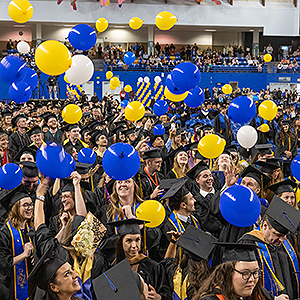 Graduates celebrate during the balloon drop at the University of Alaska Fairbanks 2023 Commencement Ceremony at the Carlson Center Saturday, May 6, 2023. UAF photo by Eric Engman
