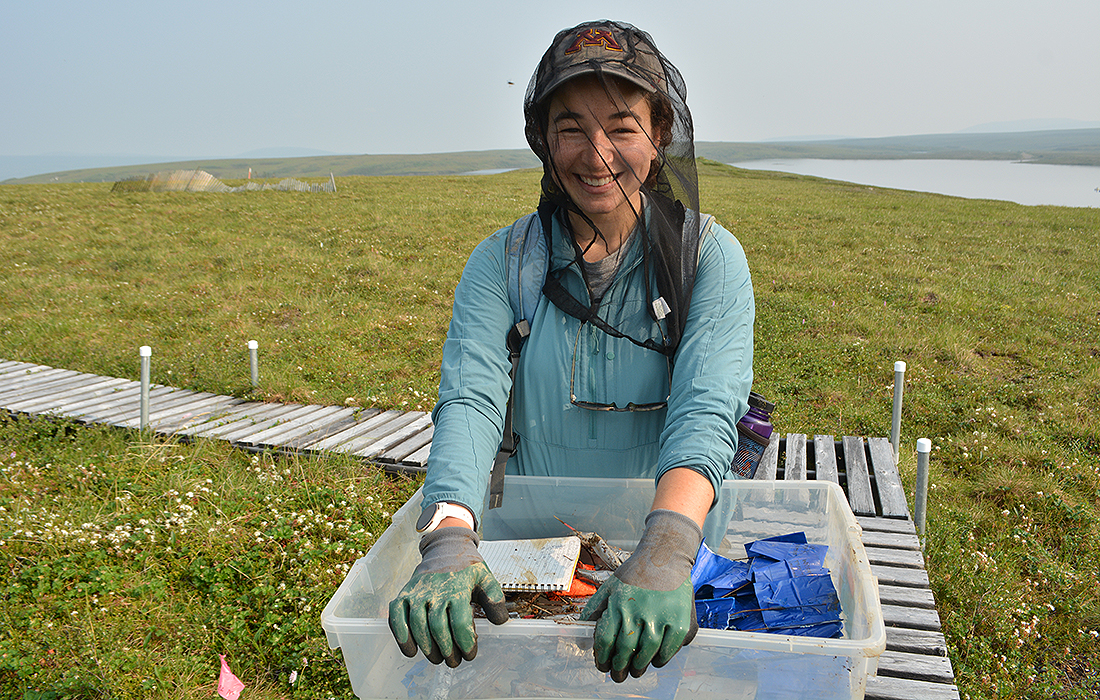 Megan Wilcots out on the Alaskan tundra doing research. Photo credit Hayley Dunleavy/Toolik field station