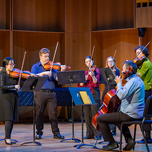 Students and Faculty of the UAF College of Liberal Arts Music Department perform a variety of string ensembles in the Davis Concert Hall ending with a final performance from the Northern Lights String Orchestra under the direction of Dr. Yue Sun. UAF Photo by Leif Van Cise.