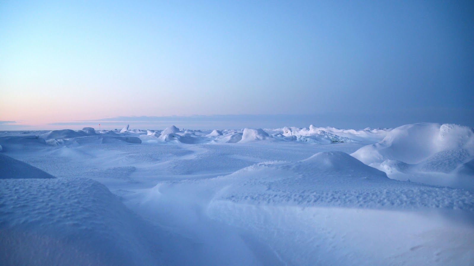 Snow covers sea ice during a research cruise in the Arctic Ocean. Photo by Amy Lauren. 