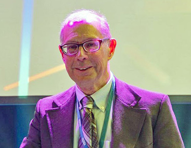John Walsh, right, receives the 2022 Mohn Prize at the Arctic Frontiers Conference in Tromsø, Norway, from Dag R. Olsen, rector of the University of Tromsø — The Arctic University of Norway. Photo University of Tromsø.