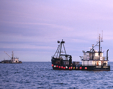 Commercial fishing vessels head out to sea near Chignik Lagoon. UAF photo by Deborah Mercy/Alaska Sea Grant