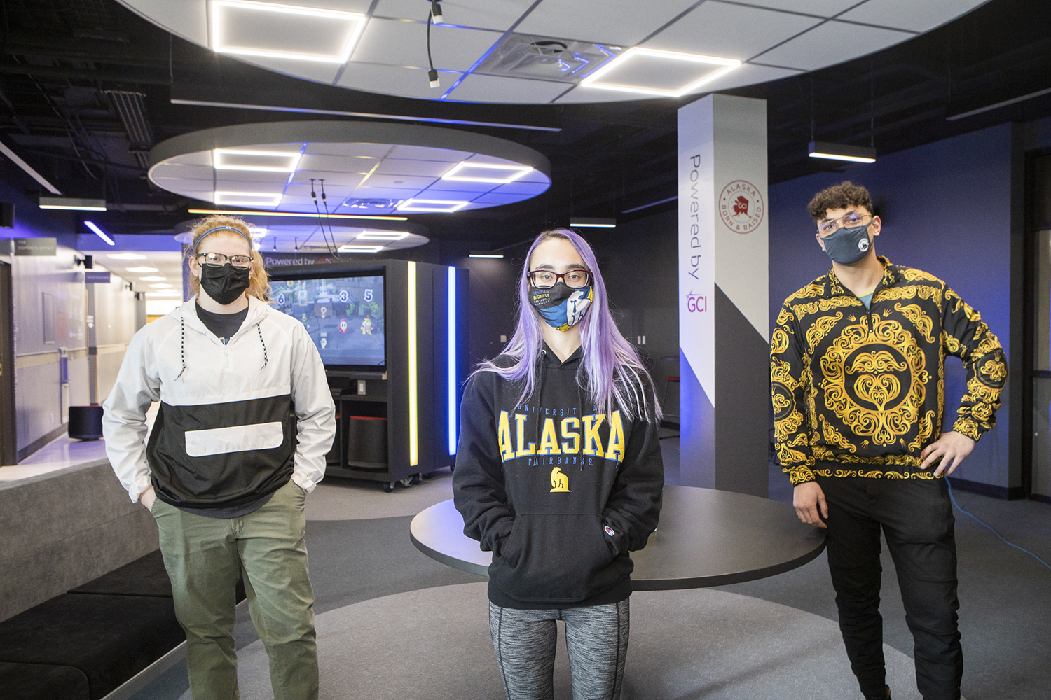 From left, Victoria Pennington (interdisciplinary studies), Shayna Smith (sport and recreation business) and Kyle Agustines (art) helped introduce UAF's esports center in a video produced for the virtual grand opening. UAF photo by JR Ancheta.