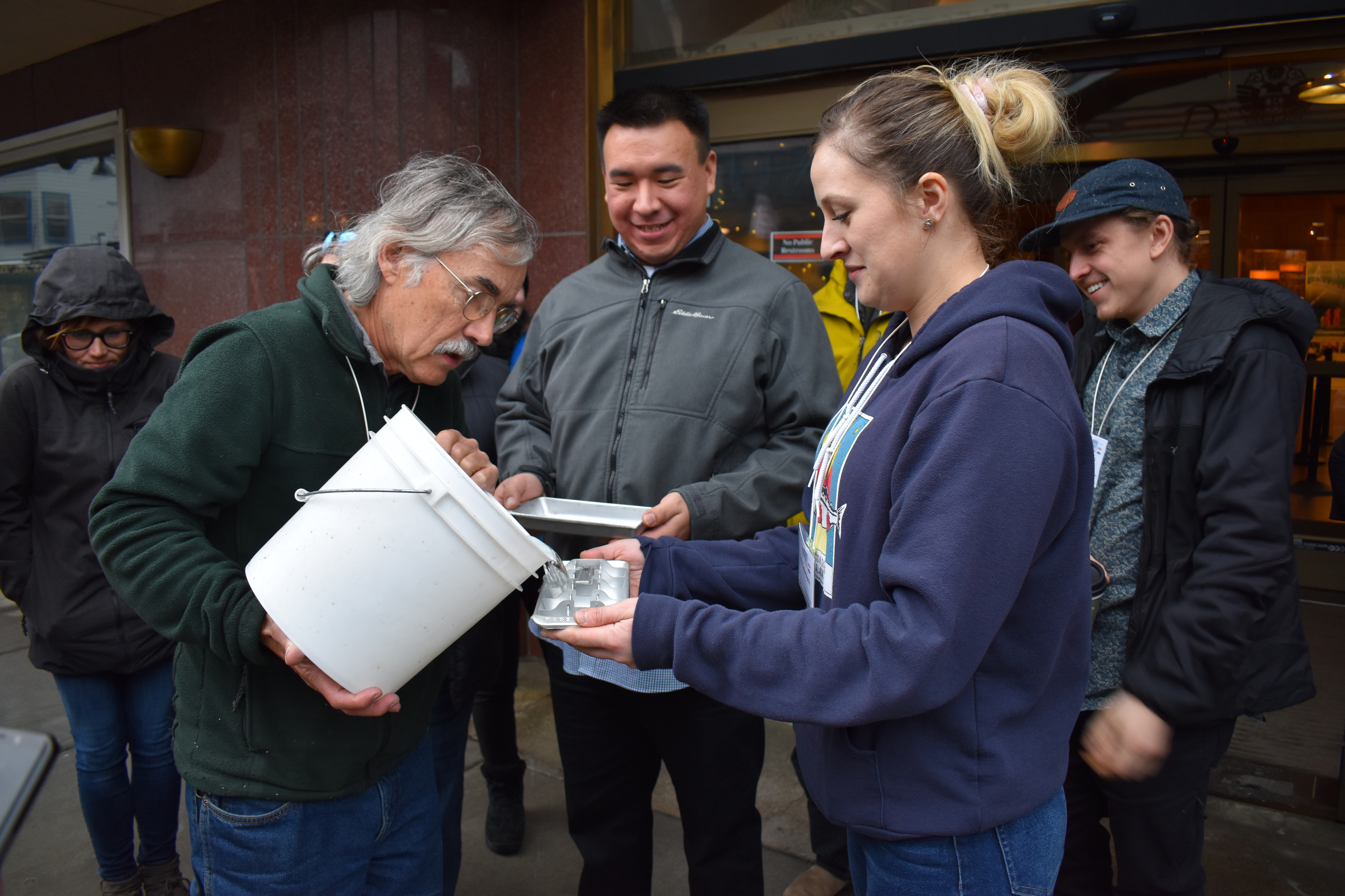 Participants in the Alaska Young Fishermen&rsquo;s Summit use ice cube trays to learn about the center of gravity and stability in fishing vessels. Photo by Dawn Montano.