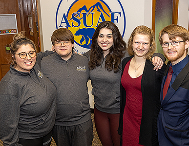 From left, Sarah Finney and Cole Osowski, ASUAF’s incoming vice president and president, join Riley von Borstel, who is a past president, and Ashlyn and Pierce Brooks, the outgoing president and vice president, at the student government’s offices in Wood Center in April 2023. UAF photo by Eric Engman.