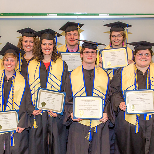 Graduates from UAF's Honors Program pose for a group photo at the conclusion of their commencement ceremony May 10 in Schaible Hall on the Fairbanks campus.