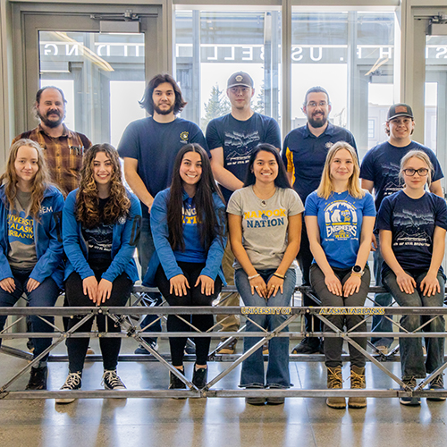 2024 UAF's CEM Steel Bridge Team poses for photos with their designed and fabricated bridge on Wednesday May 1, 2024 at the Usibelli Building.