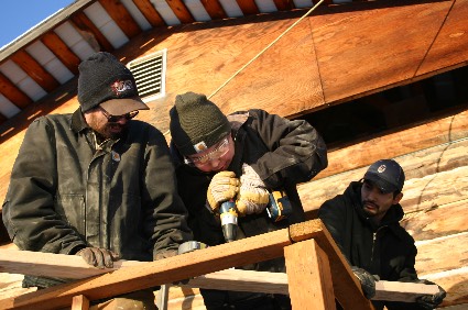 students work together in a construction course