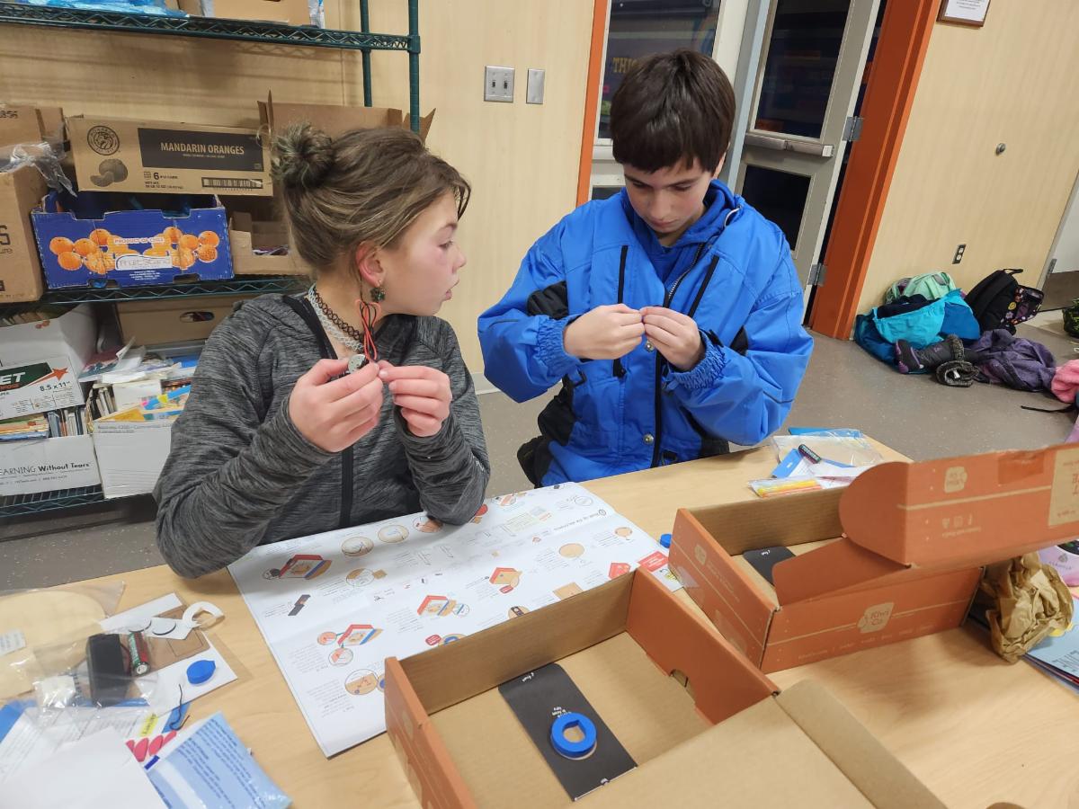 Two people working together on project