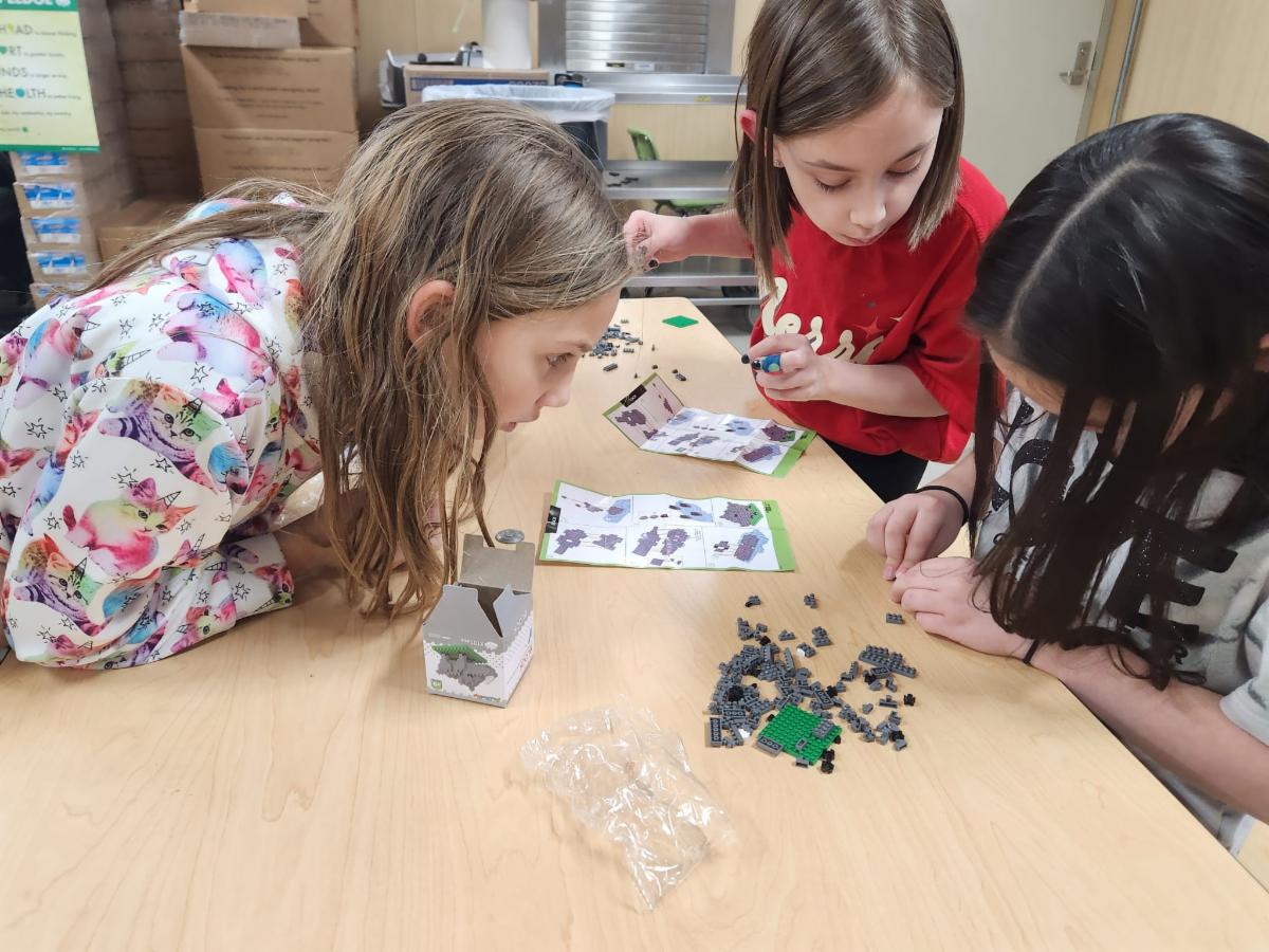 Youth working together at table