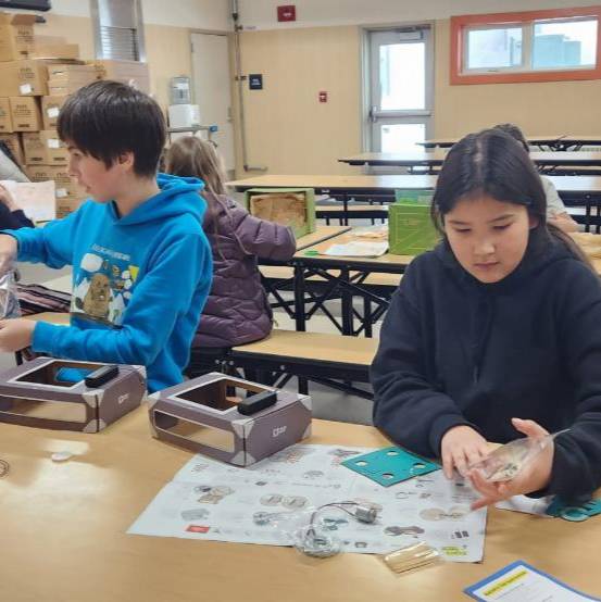 Three women smiling for photo