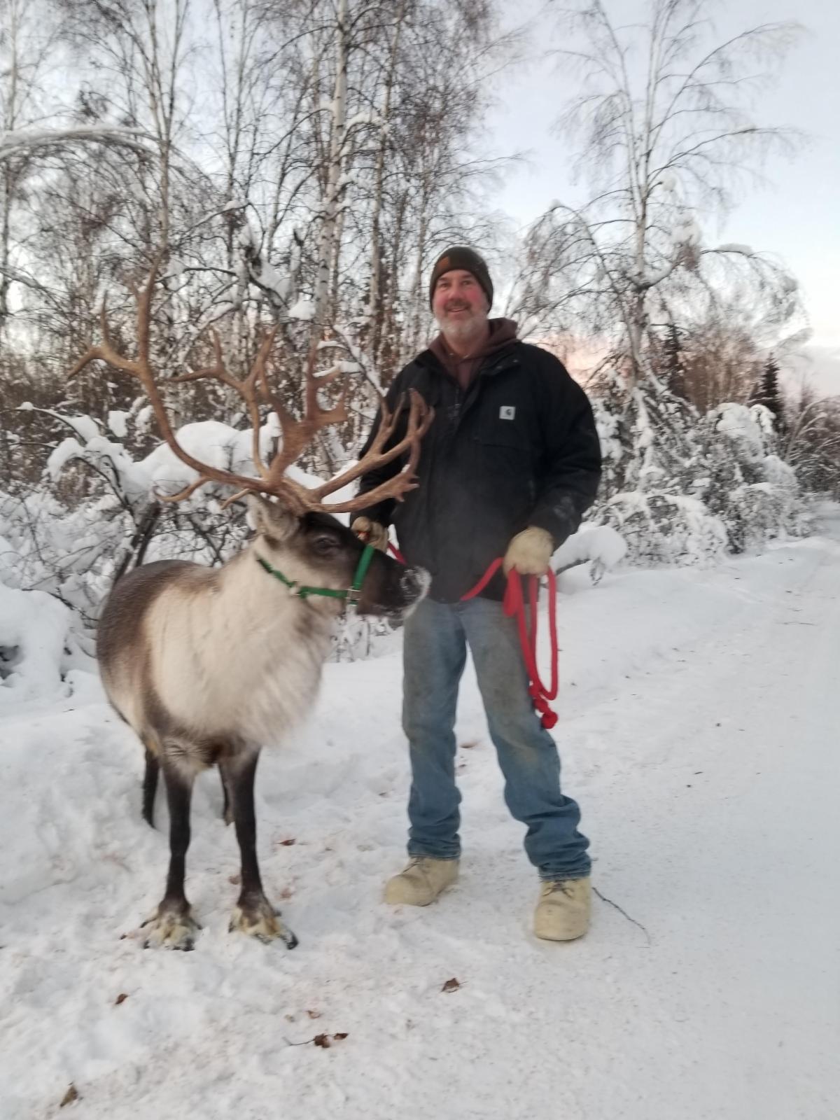 Charles Ashlock and reindeer Puma
