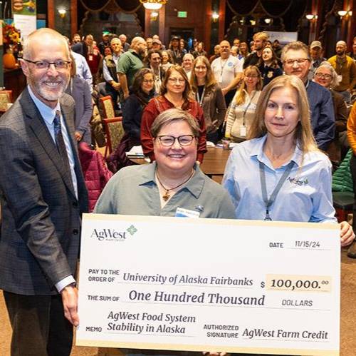 People holding check