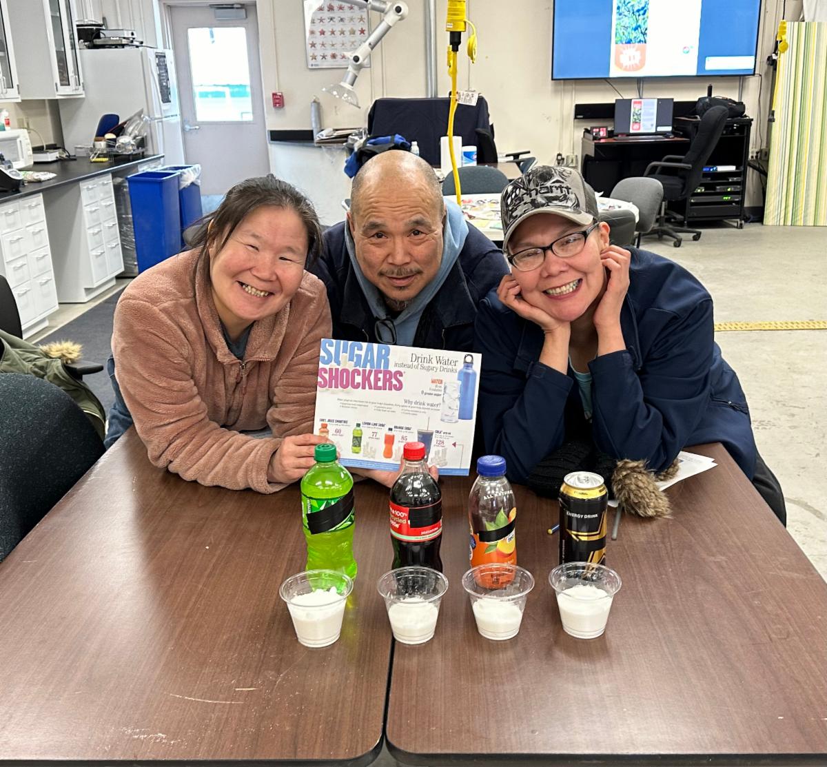 Three people posing for a photo