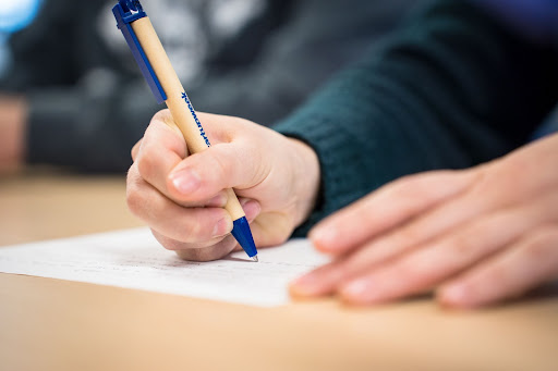 A person taking notes