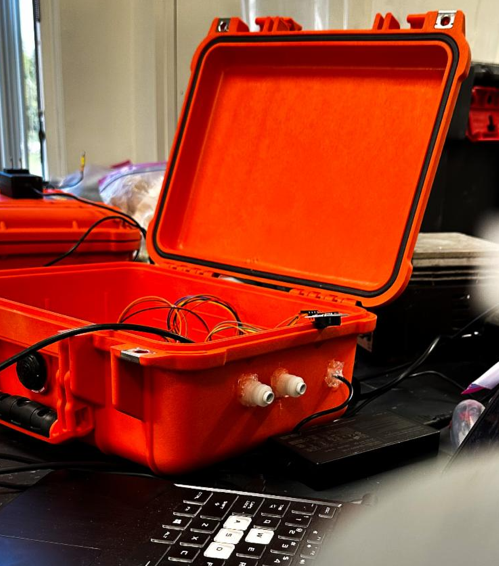 A hibernating Ground Squirrel is brought out and handled as part of the 2023 Campus Preview Day in the Murie Building. Photo by Leif Van Cise.
